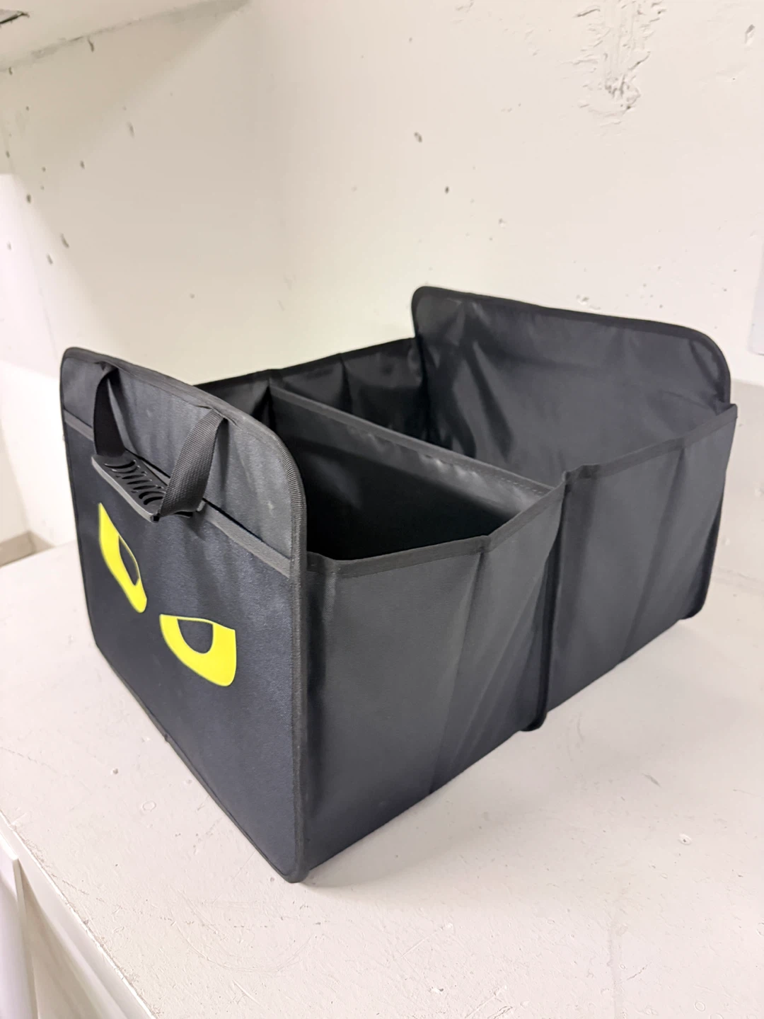 Black storage organizer, foldable.