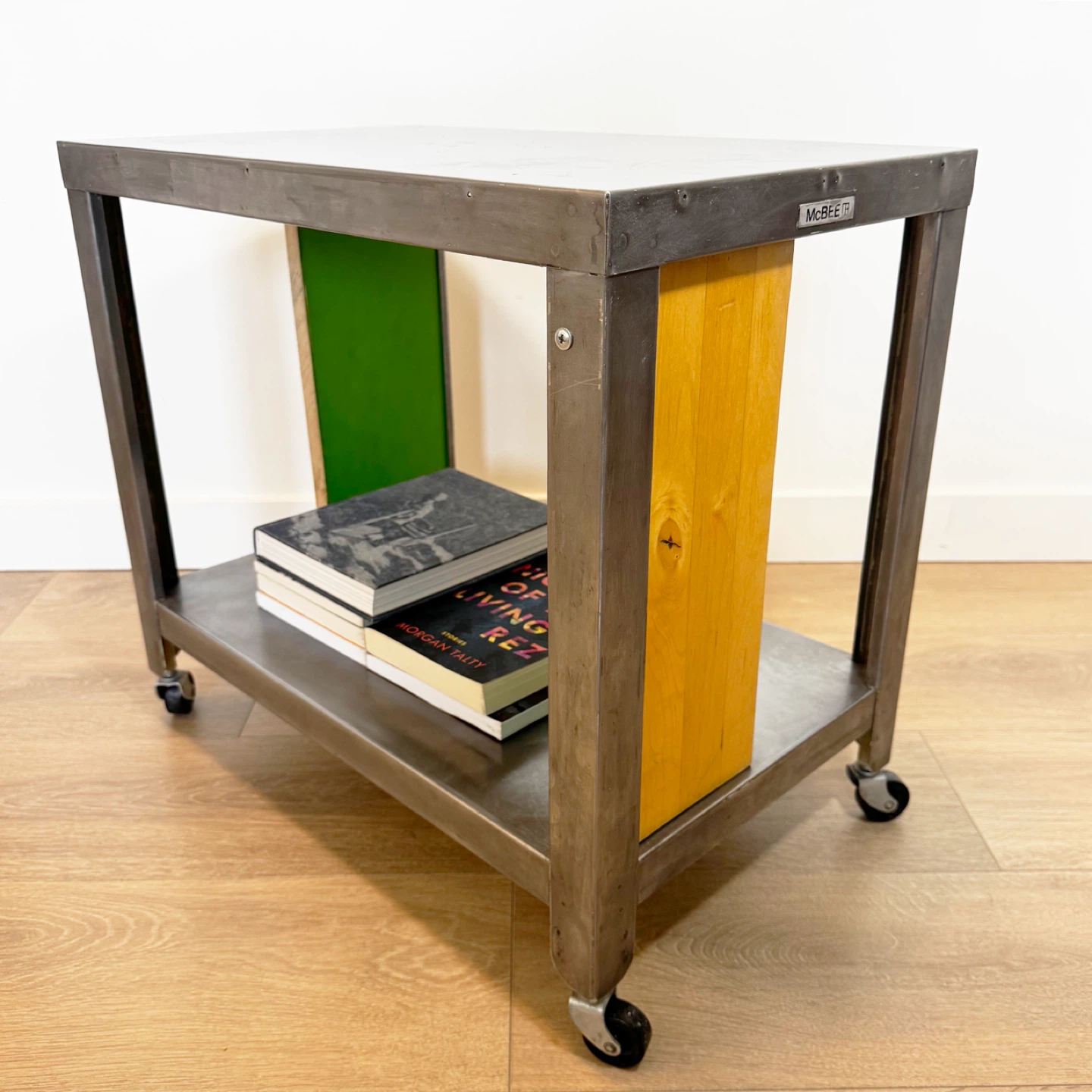 McBee Rolling industrial cart side table with wooden panels.