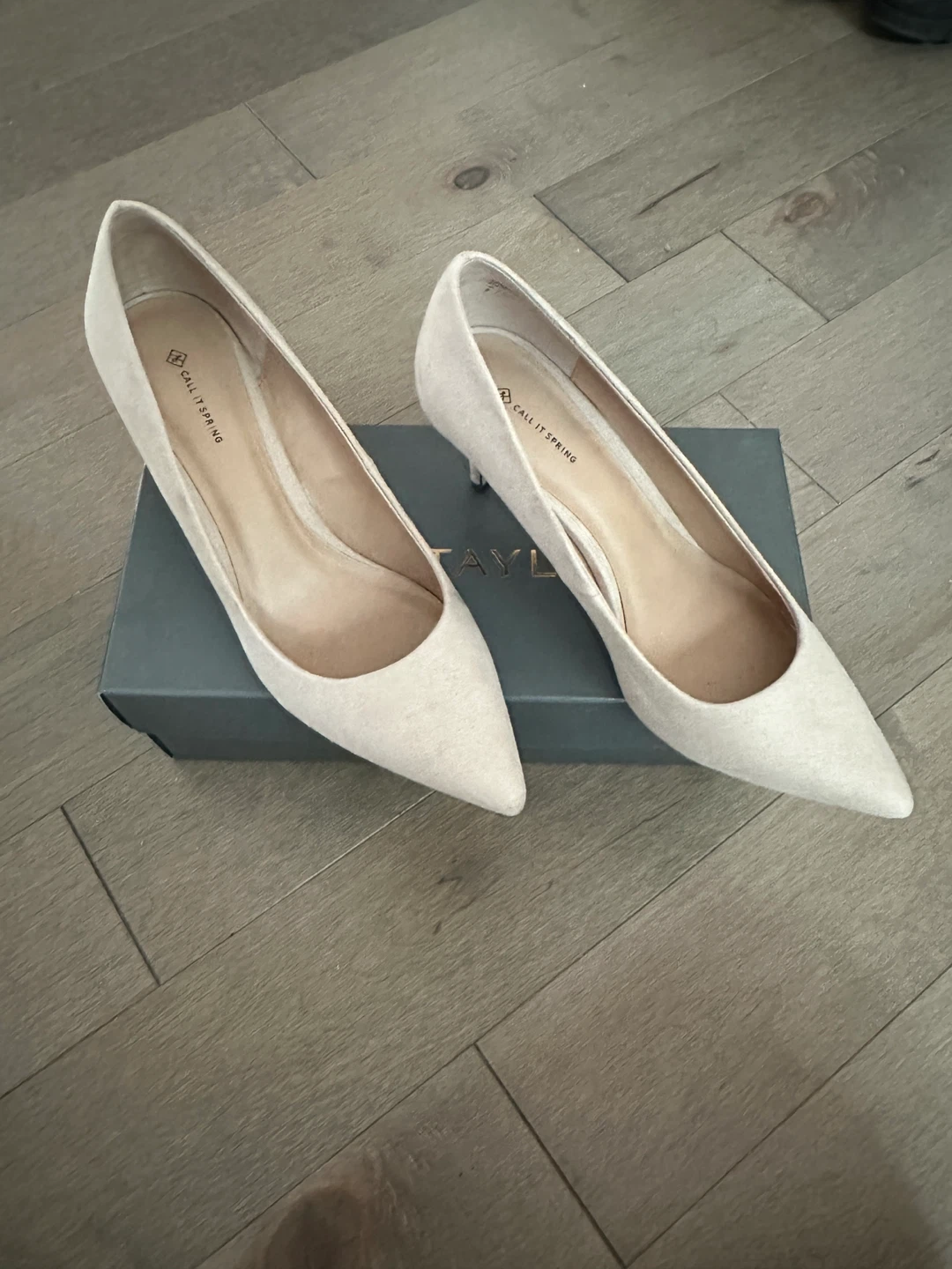 Beige suede pumps