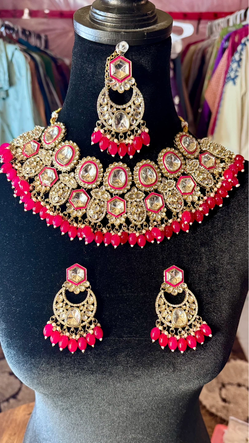 Kundan chandelier earrings with pink beads and clear stones