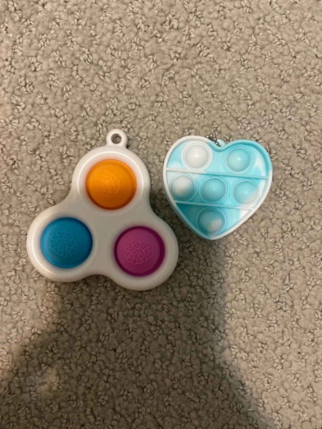 Simple dimple, and a white and blue heart pop it