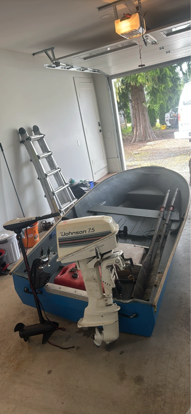 12’ fibreglass boat and Johnson 7.5hp outboard motor