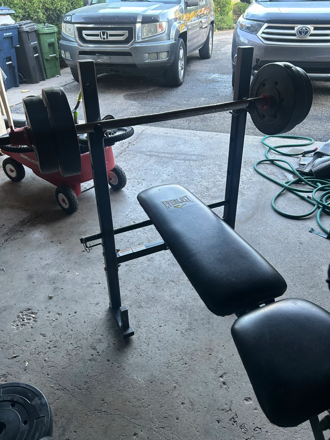 Bench press with bar and weight - photo 3