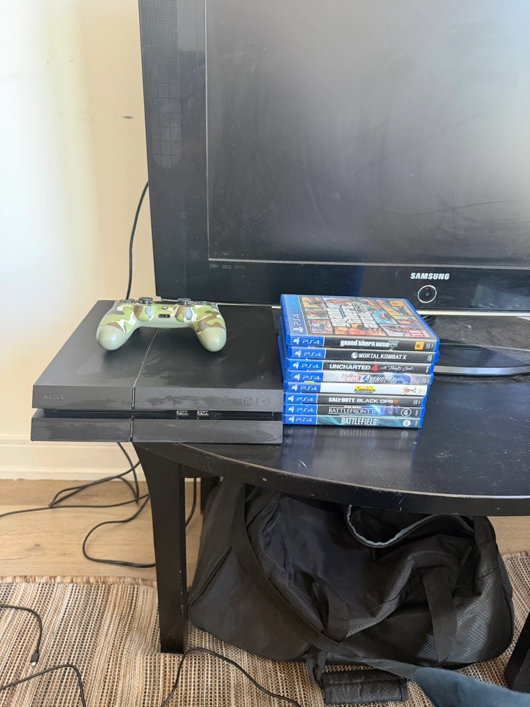 Sony PlayStation 4 Console with Controller and Games