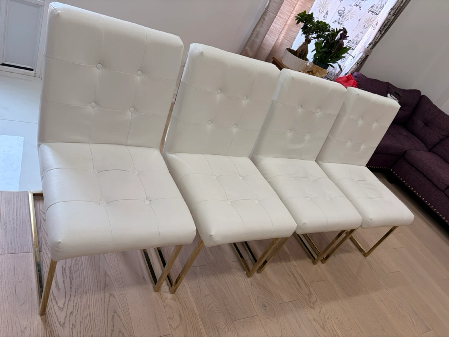 Set of 4 White Tufted Dining Chairs with Gold Legs