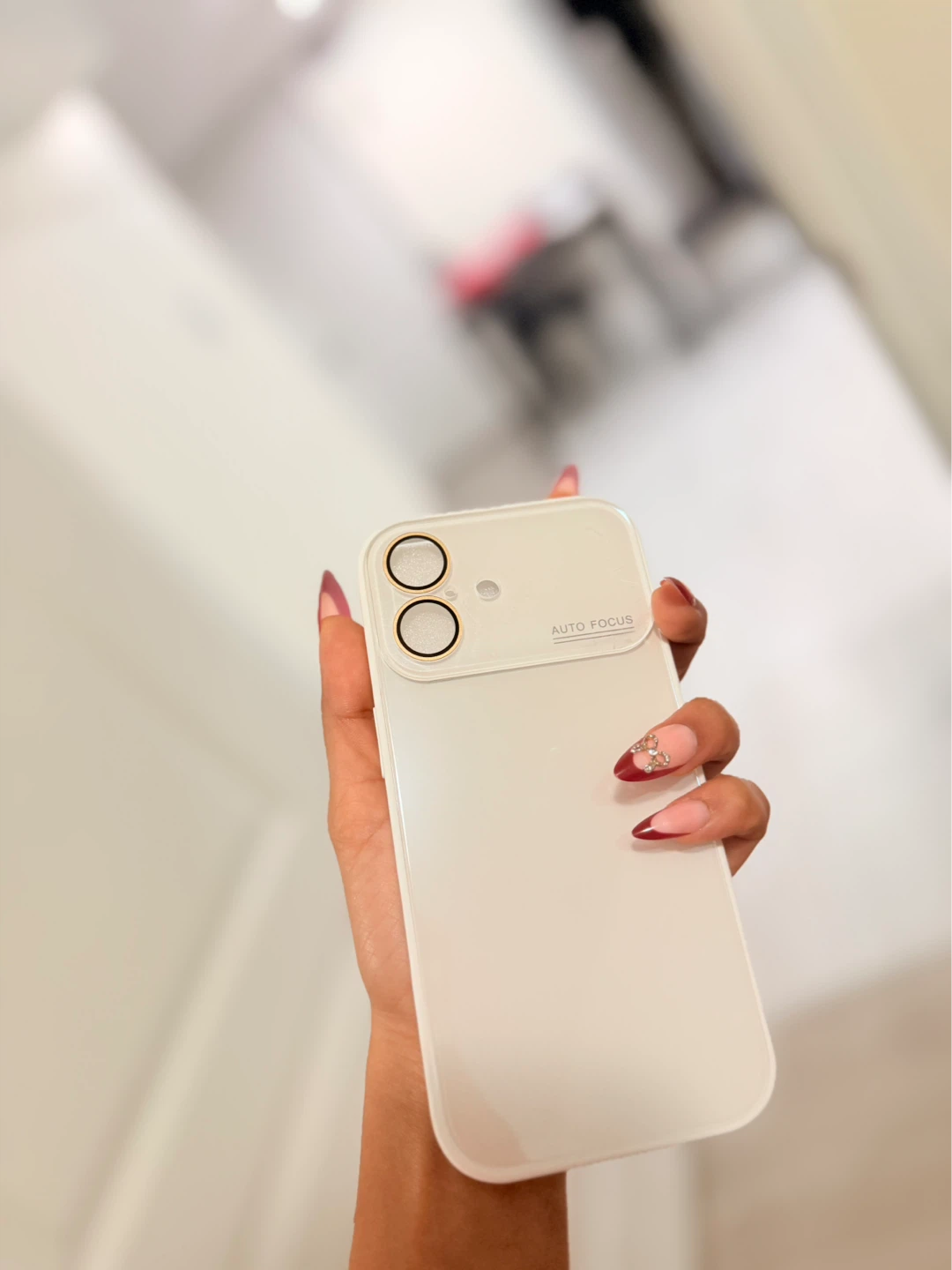 White Phone Case with Gold Camera Accents