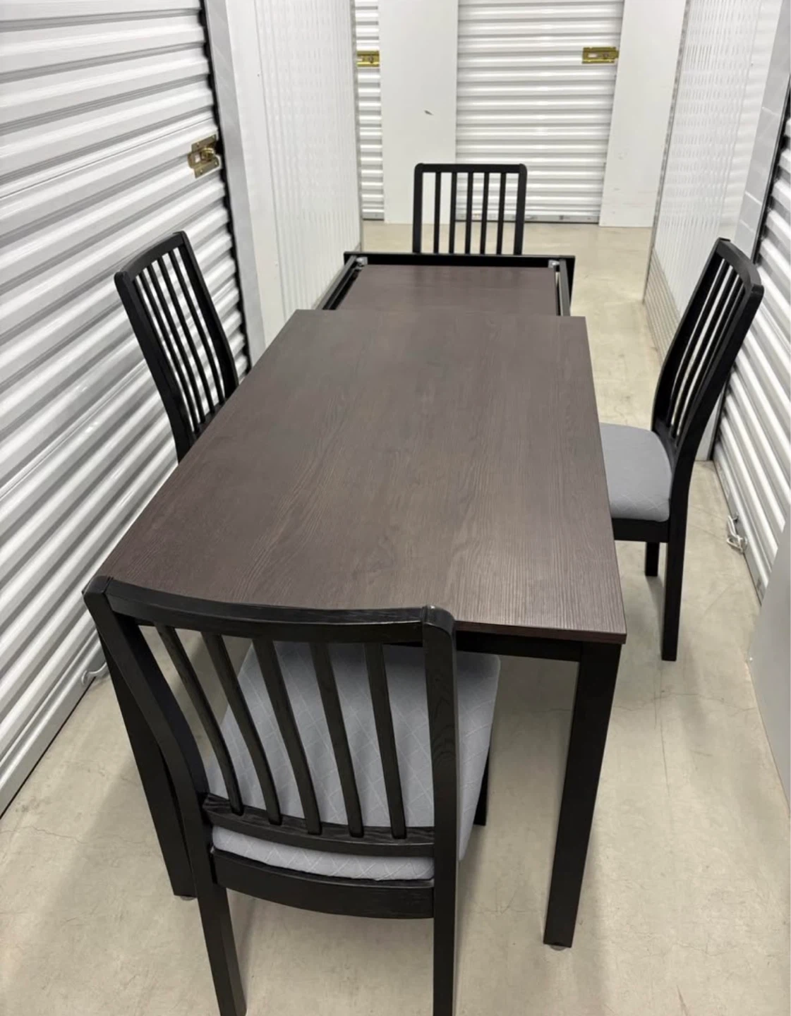 Can deliver—Ikea extendable dark brown table and 4 black chairs.