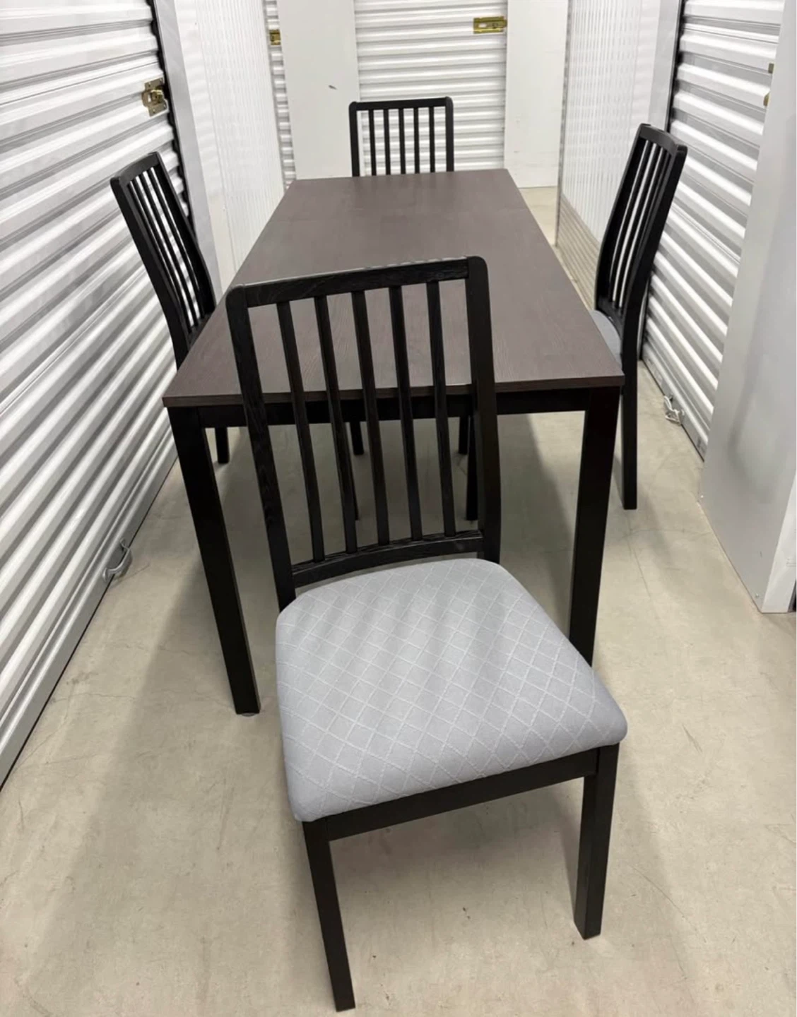 Can deliver—Ikea extendable dark brown table and 4 black chairs. - photo 2