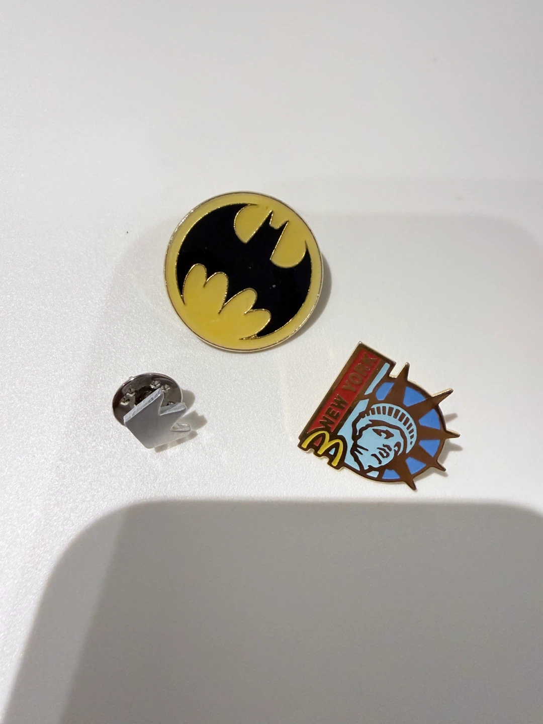 Pins: Batman, Statue of Liberty,