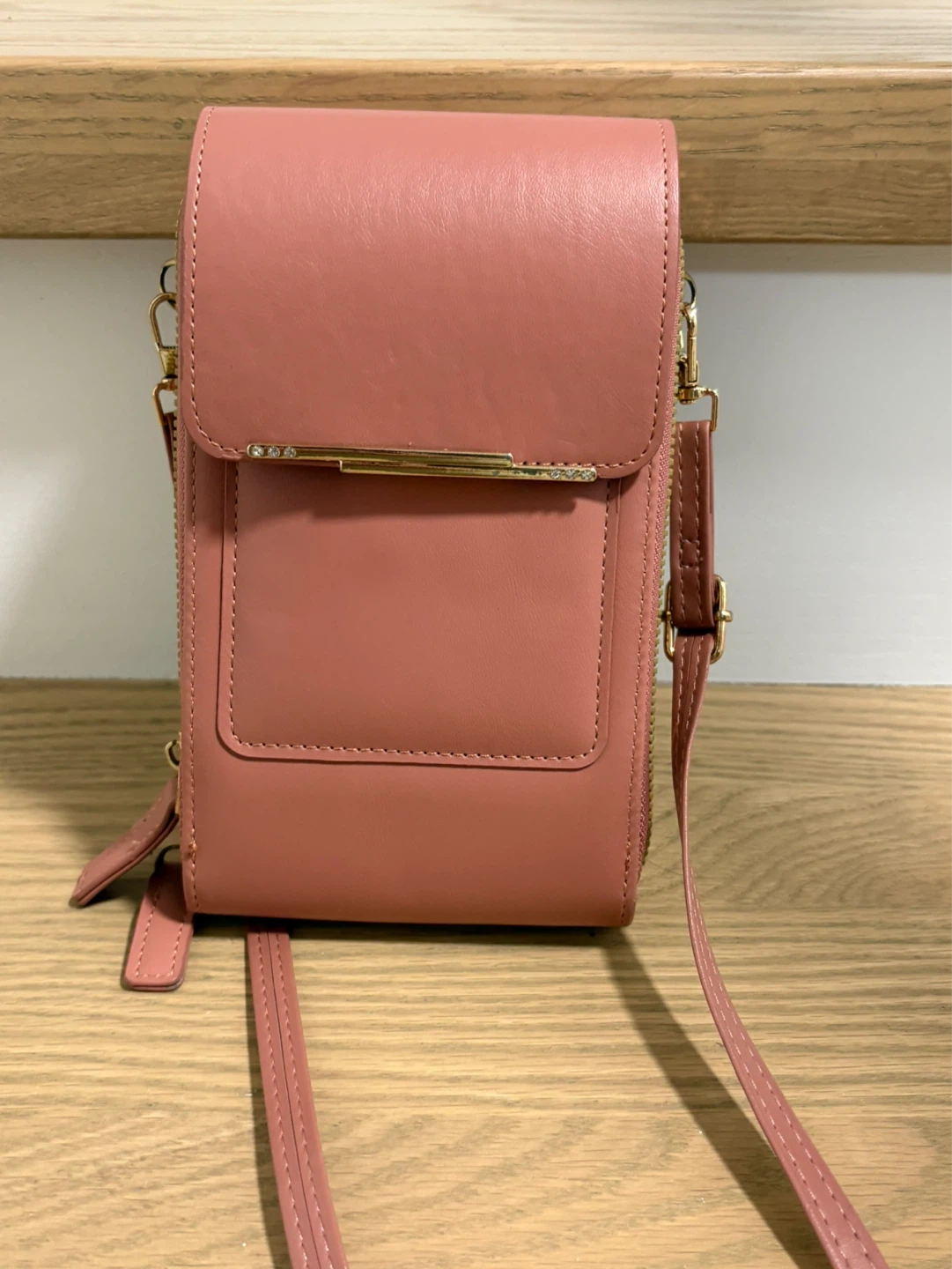 Pink crossbody phone bag with card slots