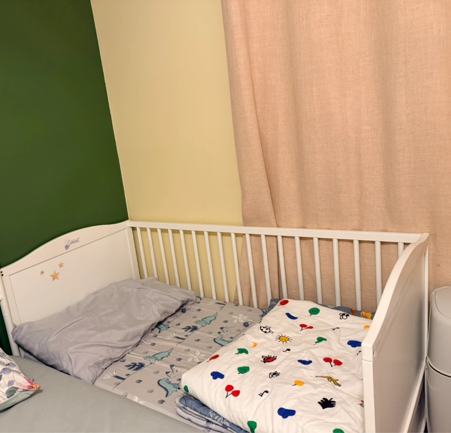 White crib with star accents