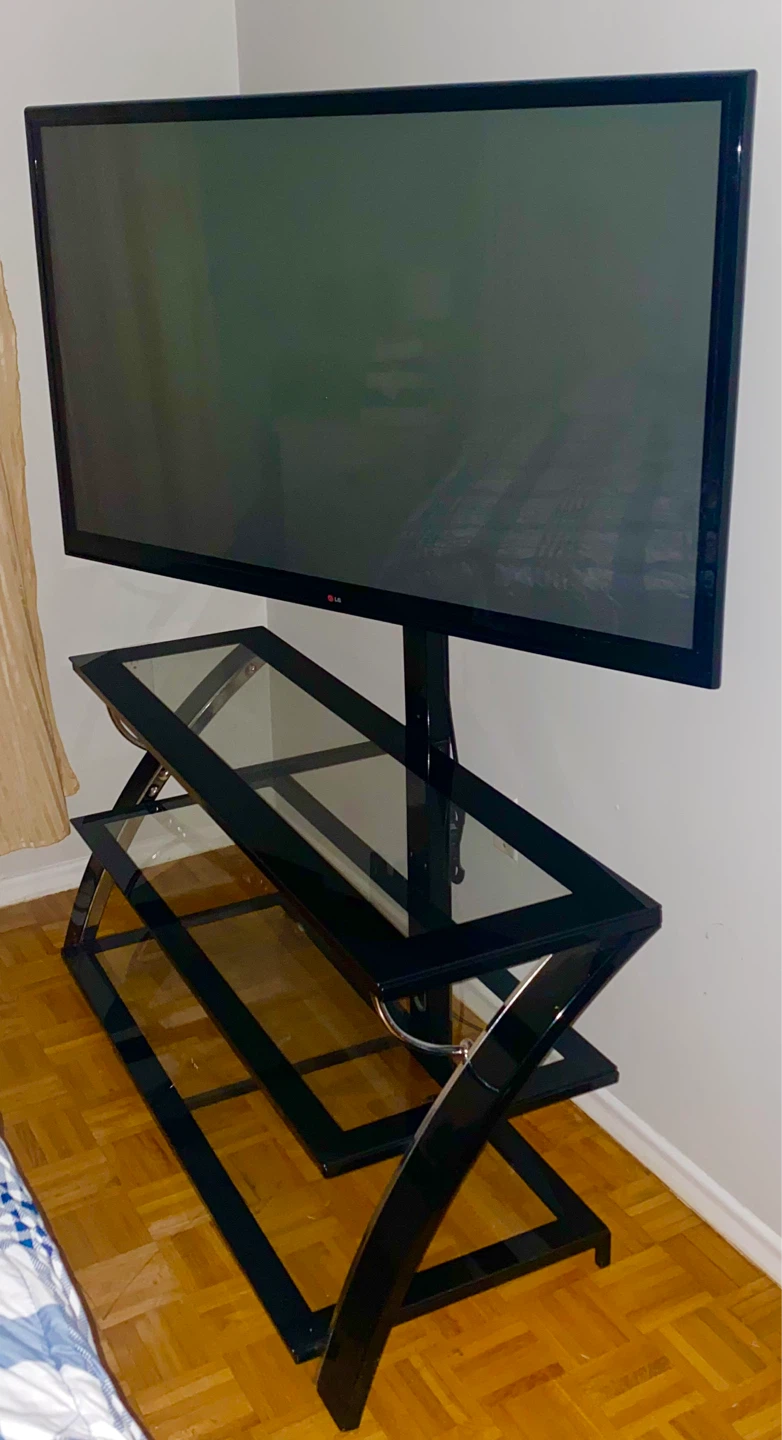 LG Flat Screen TV with Black Glass Stand