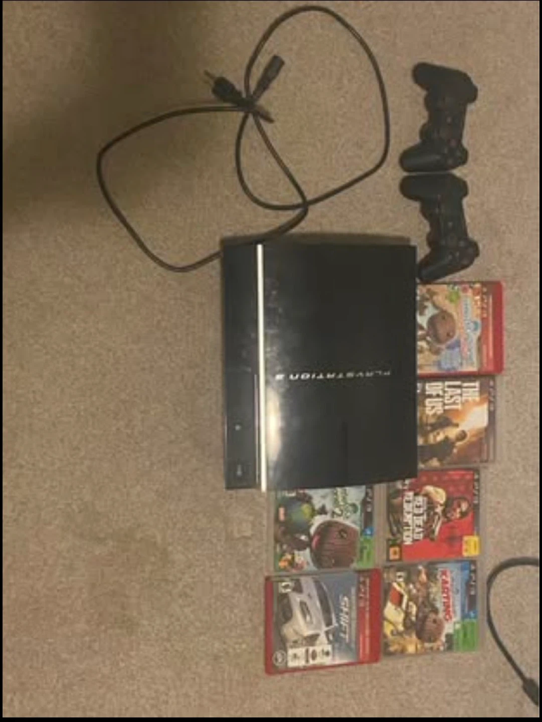 PlayStation 3 Console with 6 Games and 2 Controllers