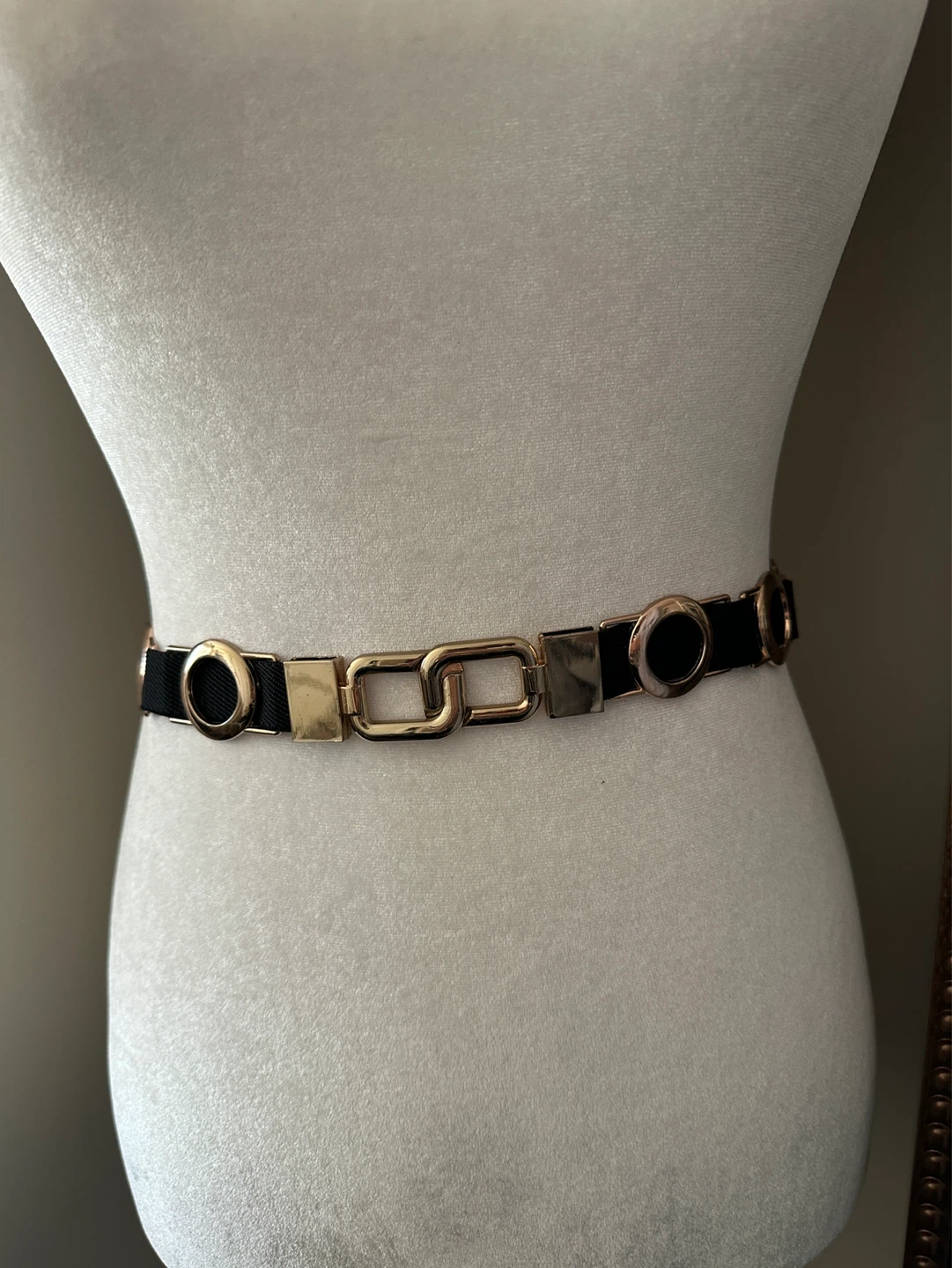Black elastic belt with gold tone hardware