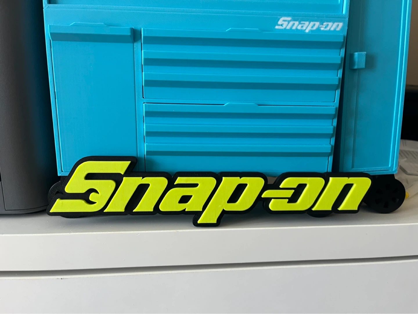 Snap-on logo badge