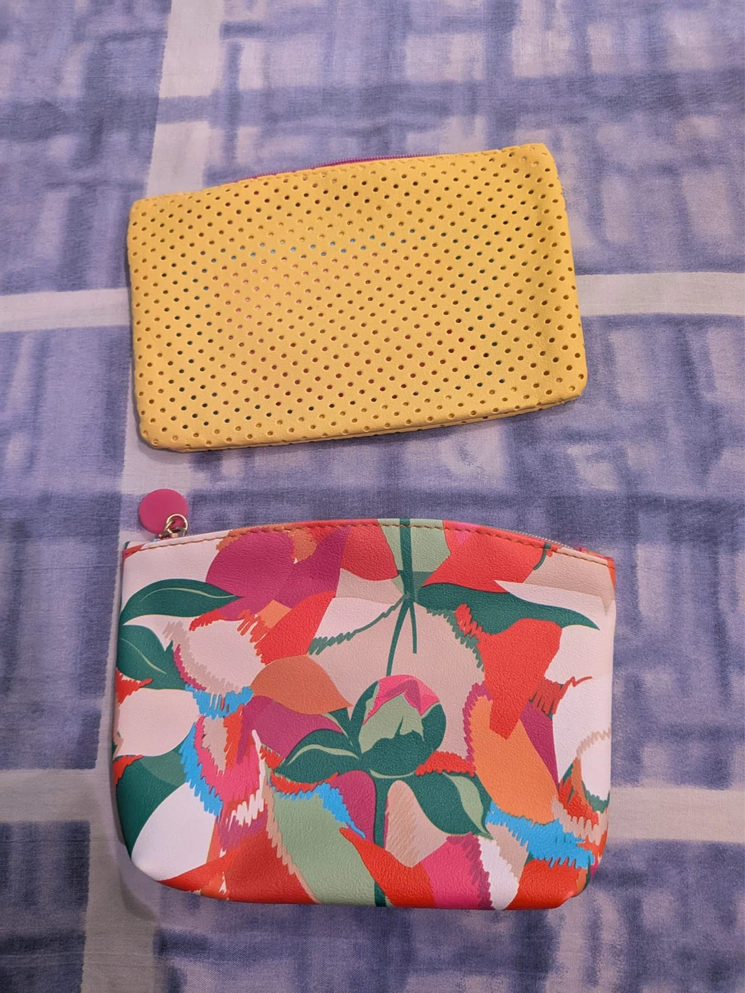 Two Pouches: Yellow Perforated and Floral Print