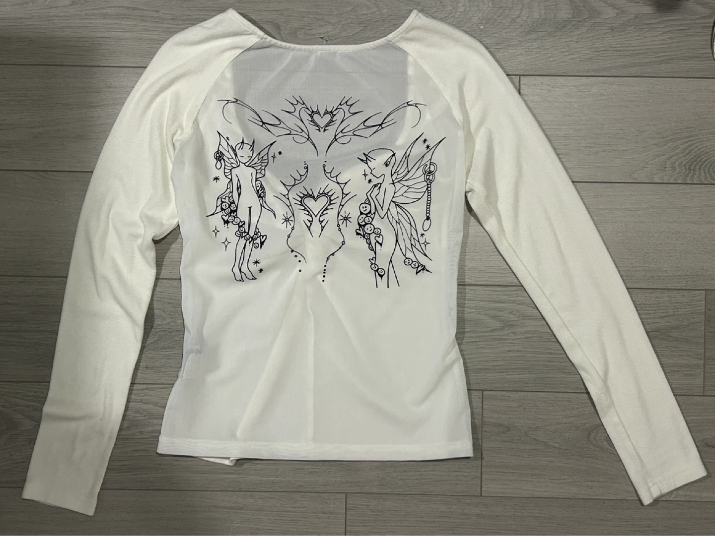 back detail angel top size l