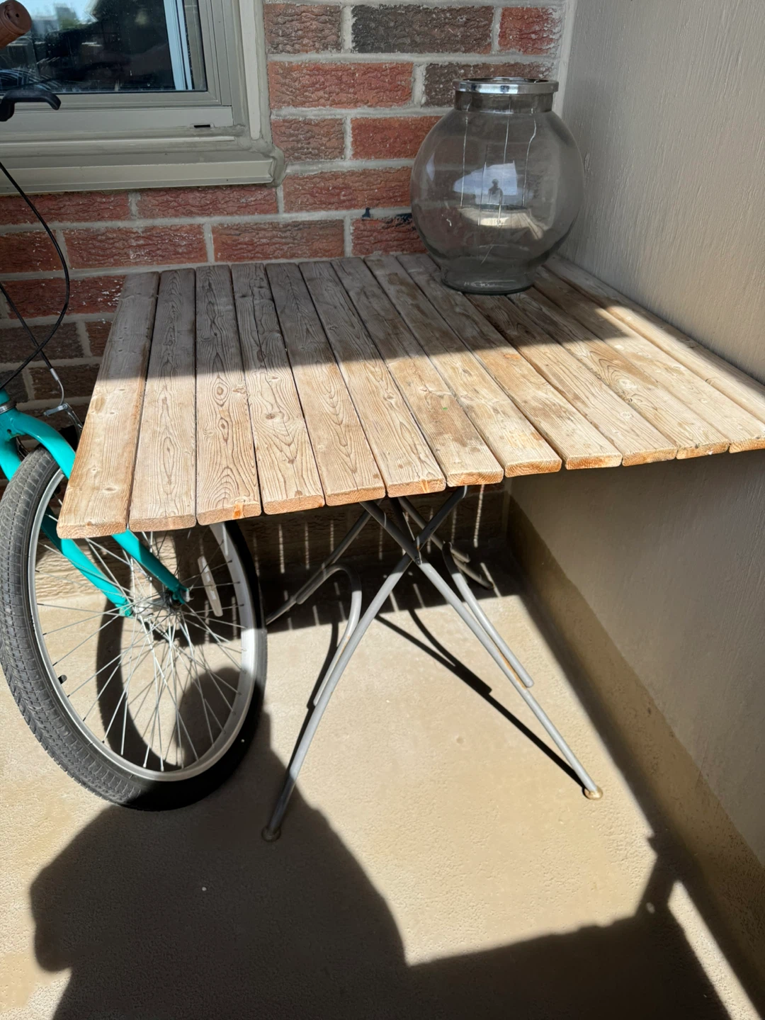 Wooden folding table with metal legs