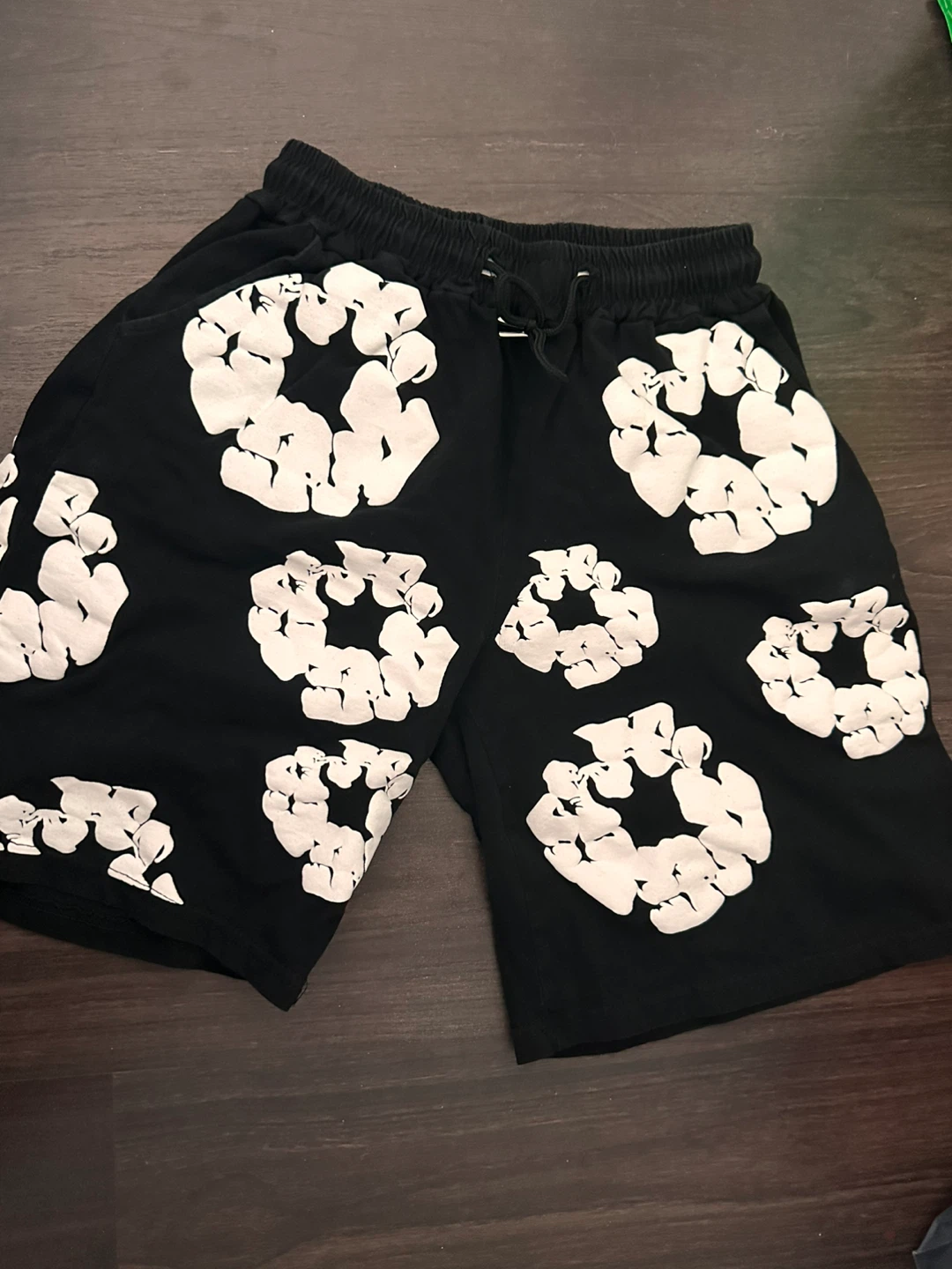 Black shorts with white graphic print