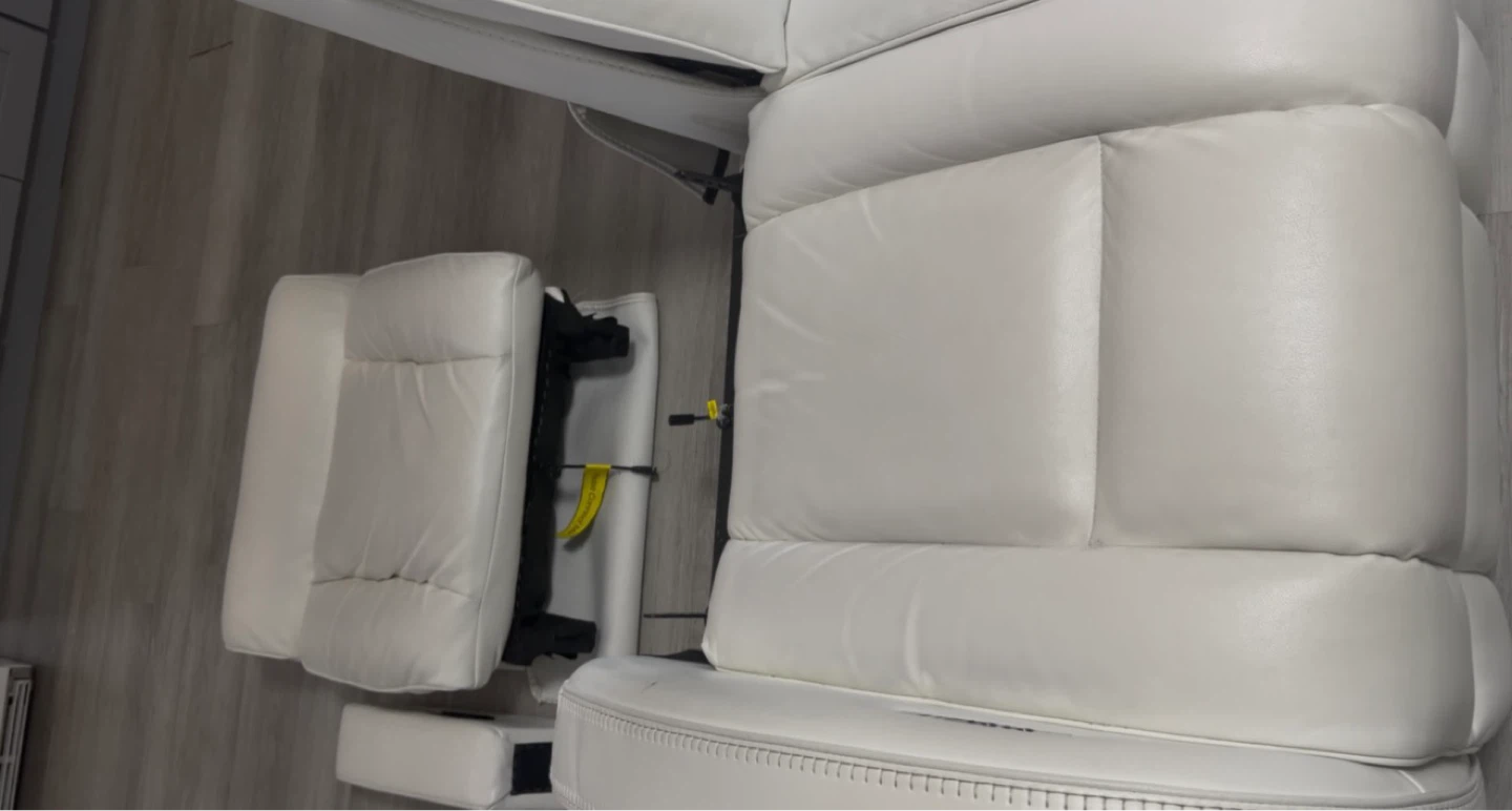 Bob’s Furniture White Leather Recliner Sofa with Center Console - photo 5