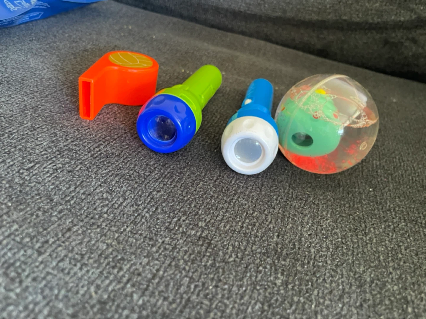 Toy Flashlights, Whistle, and Bouncy Ball Set