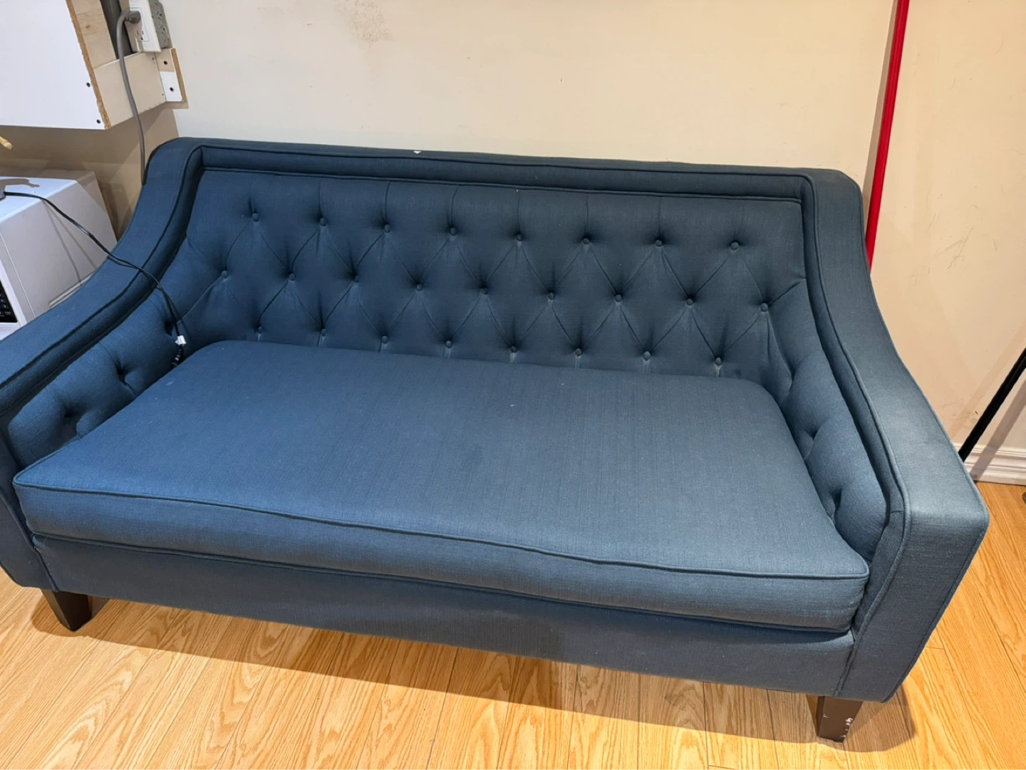 Blue Tufted Loveseat