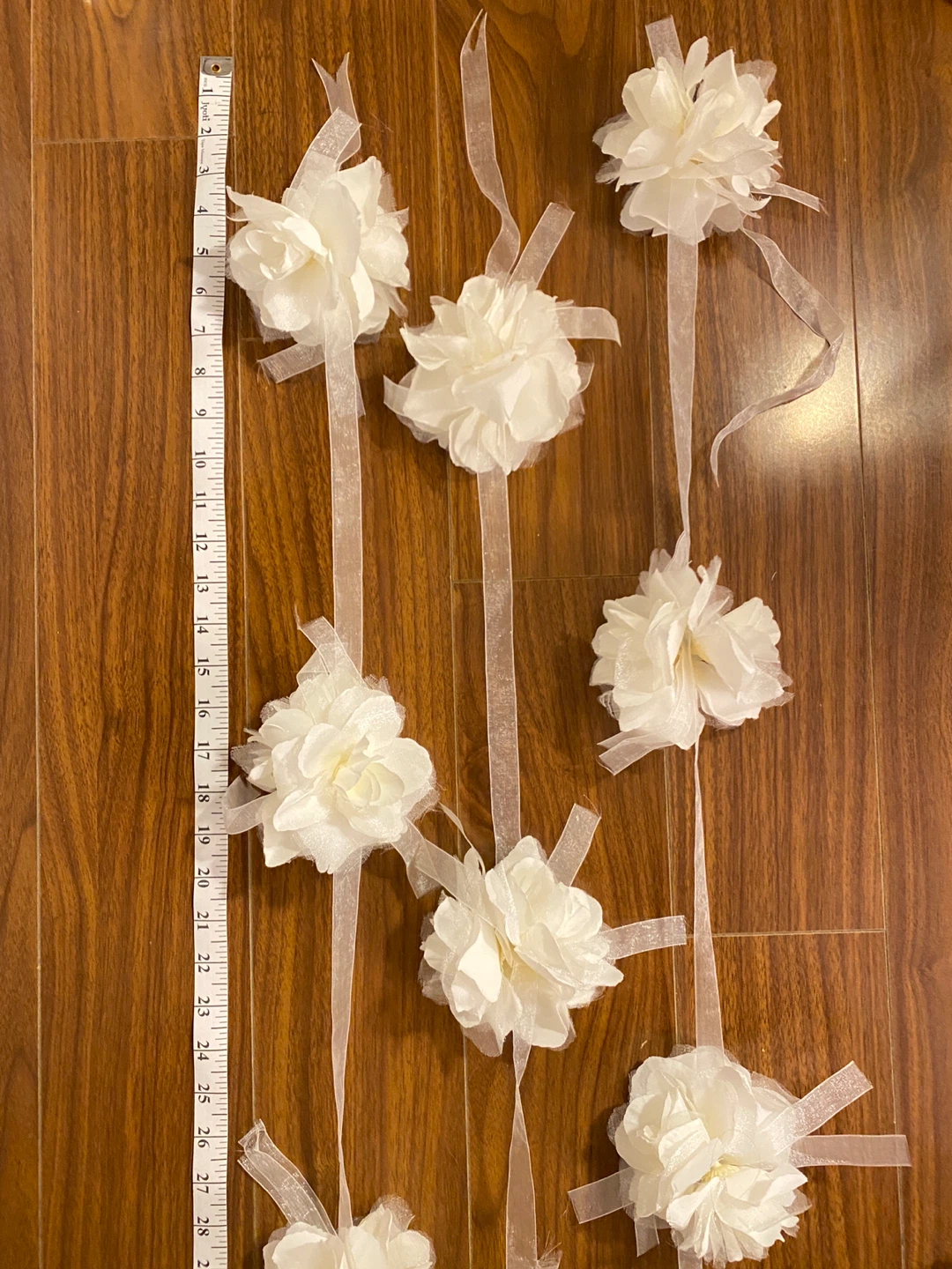 Luxurious White Flower Garlands with Shimmering Tulle Ribbon