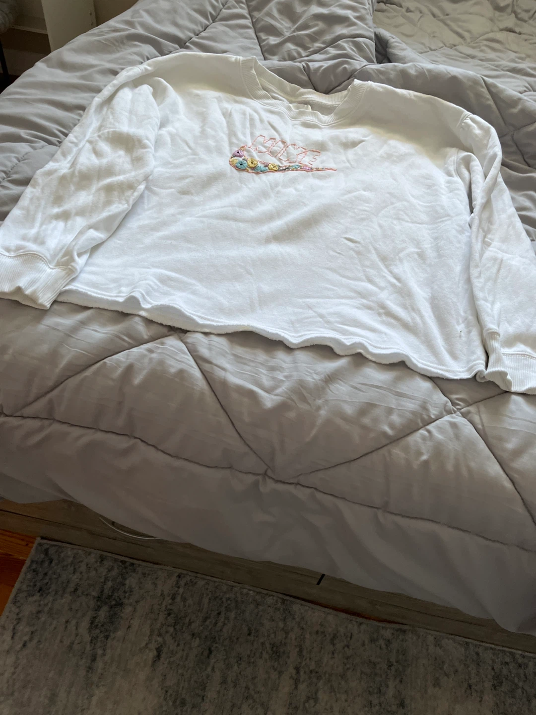 White Crewneck Sweatshirt with Rainbow Embroidery