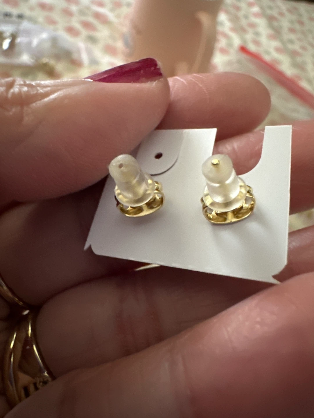 Gold laminated stud earrings with white inlay and rhinestones - photo 2