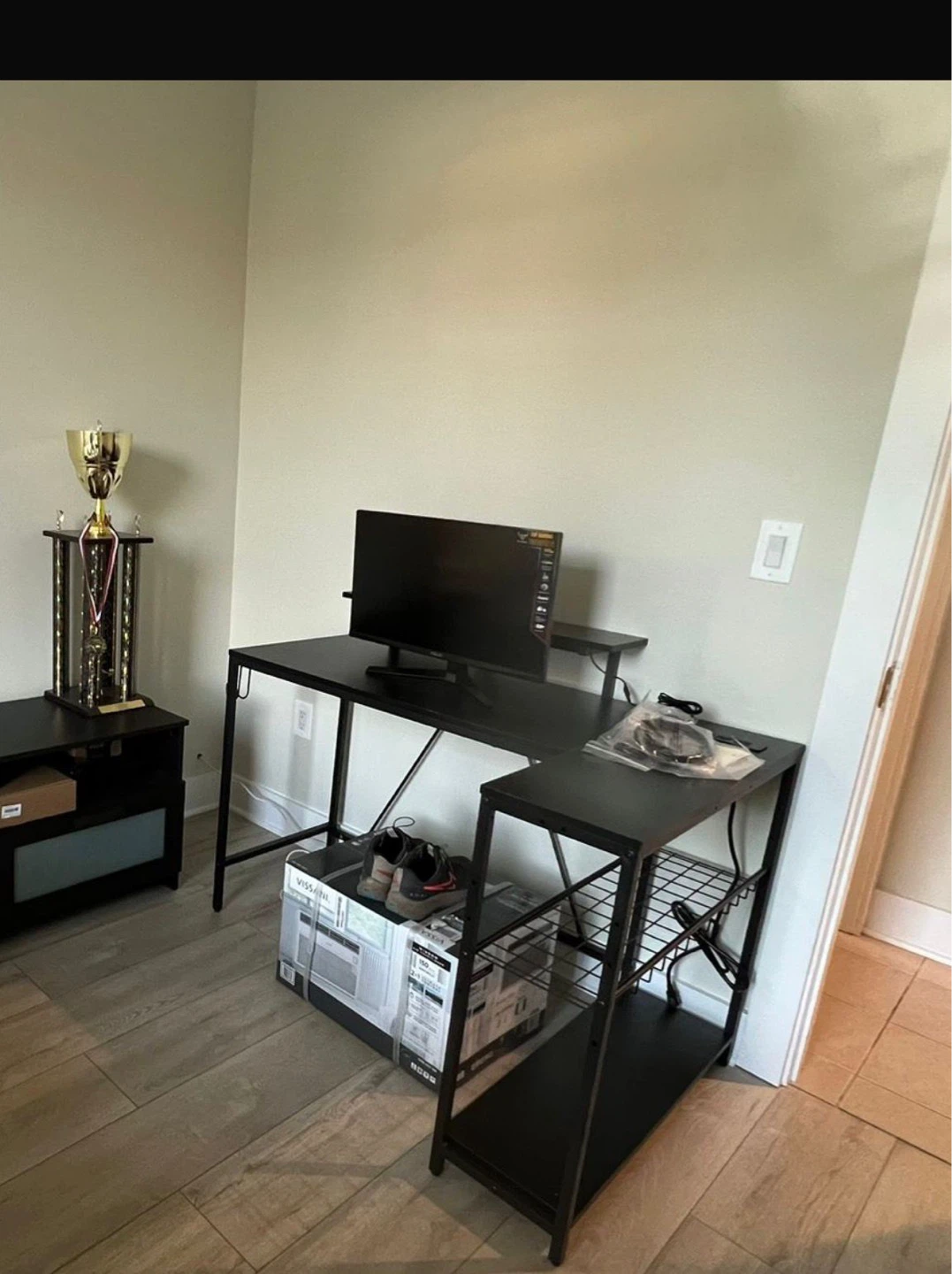 Black Computer and  Desk with Shelving