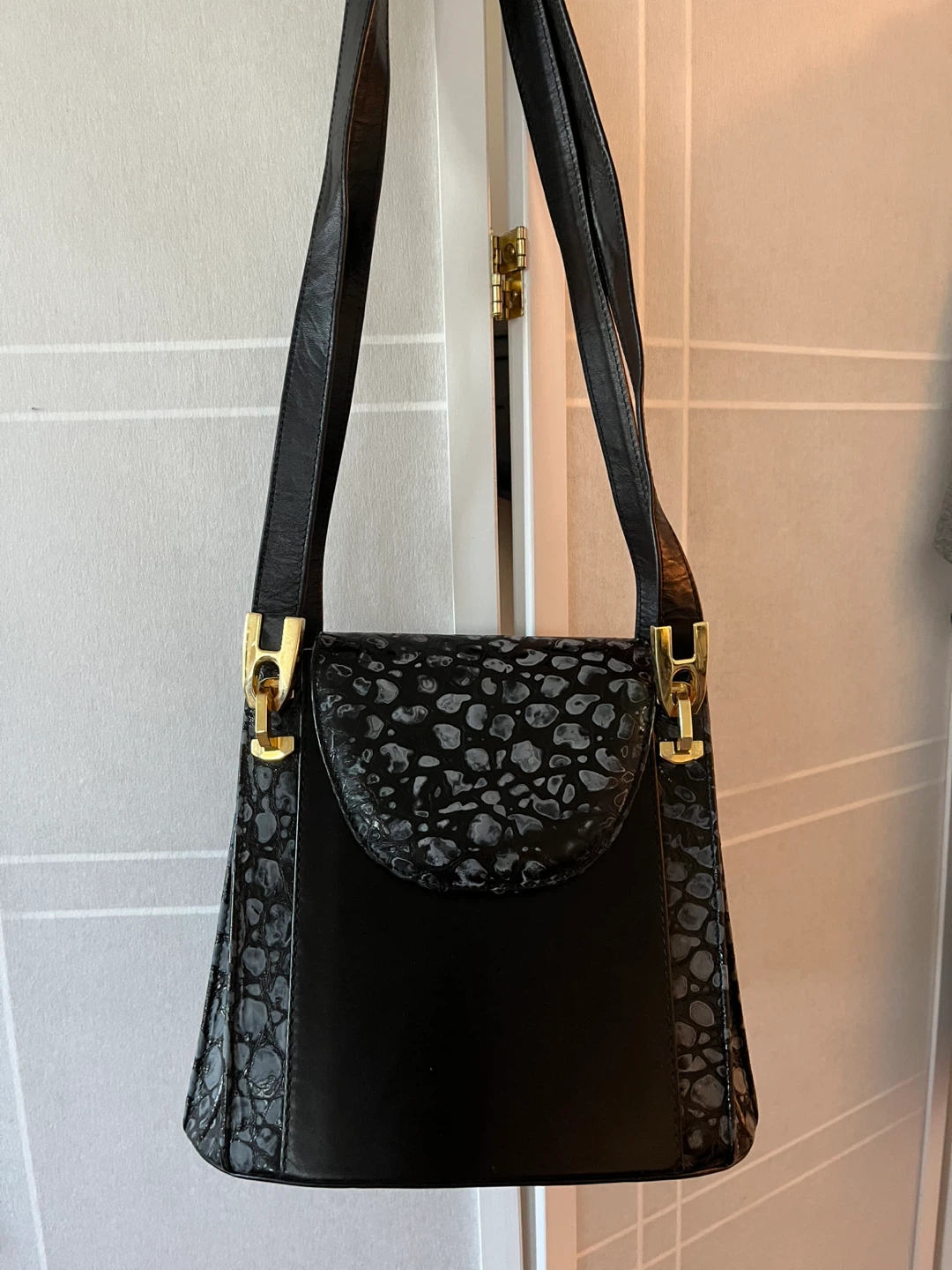 Black Shoulder Bag with Embossed Accents