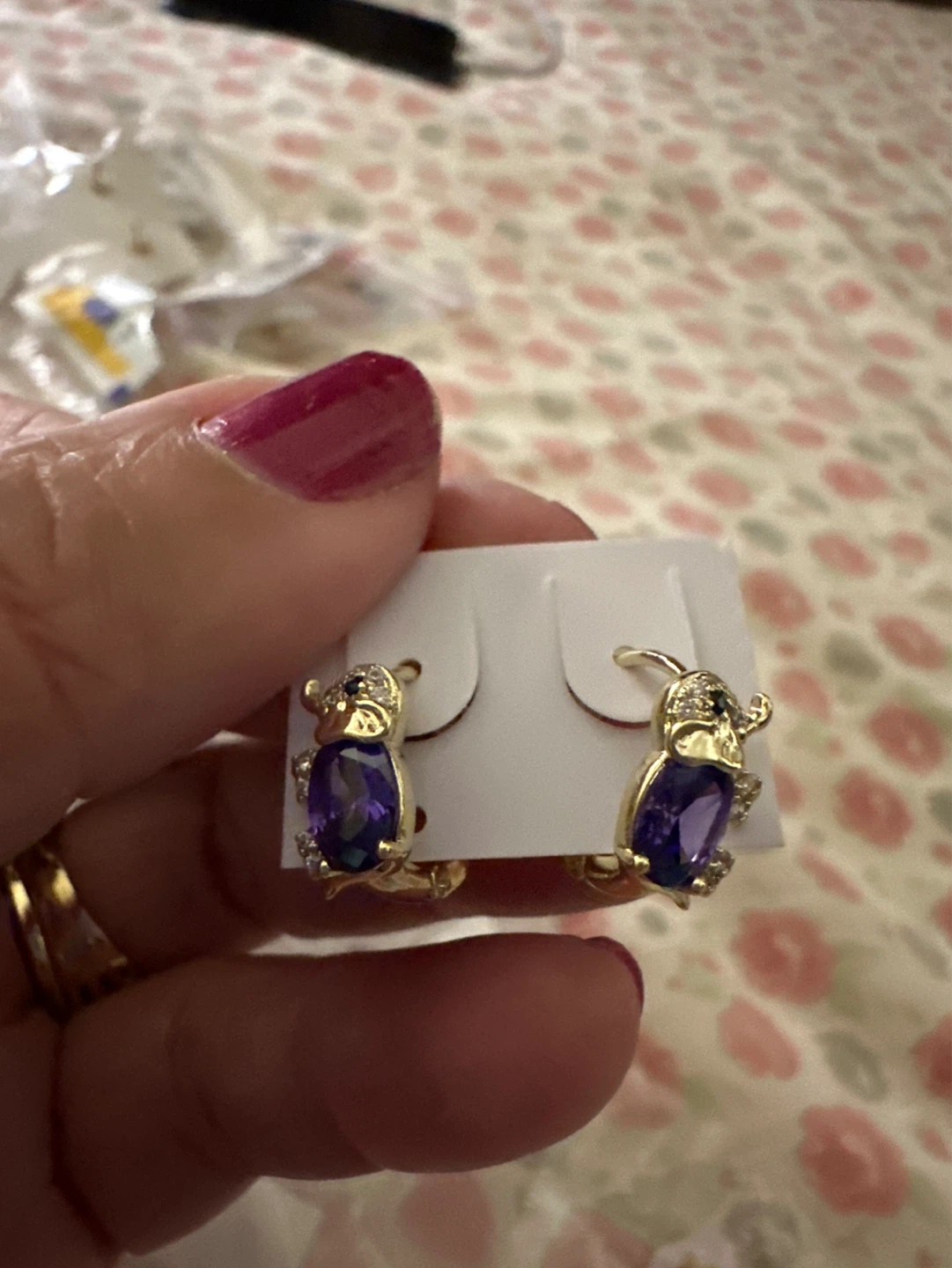 Gold laminated Winnie the Pooh earrings with purple stones