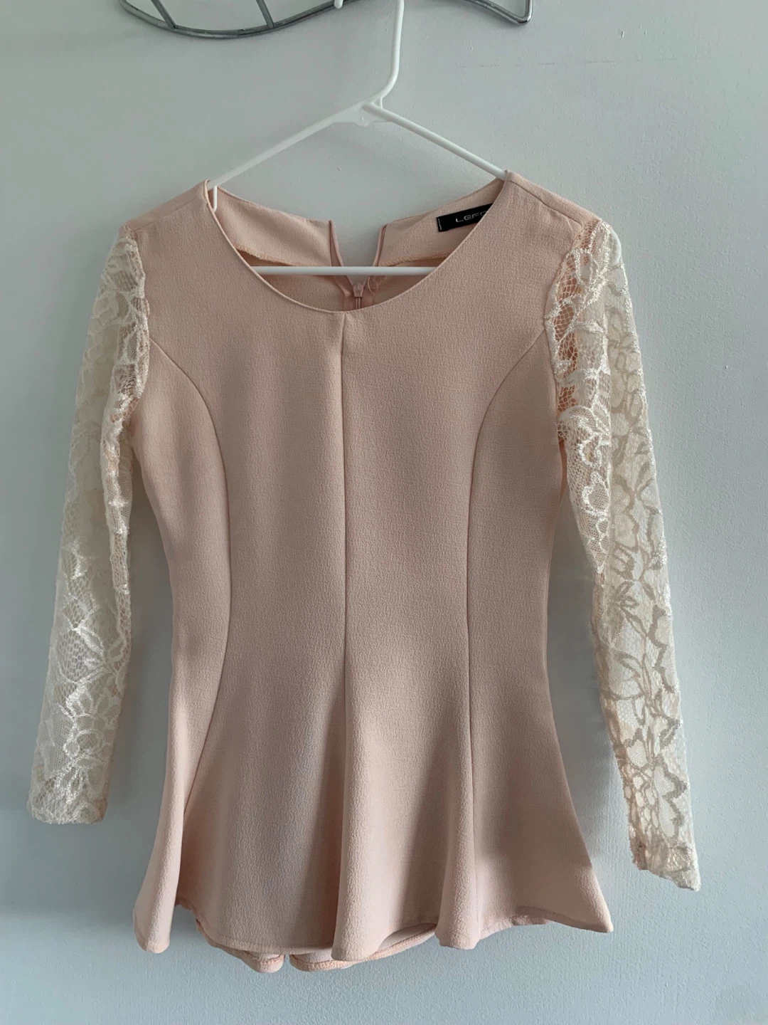 Pink lace sleeve peplum top