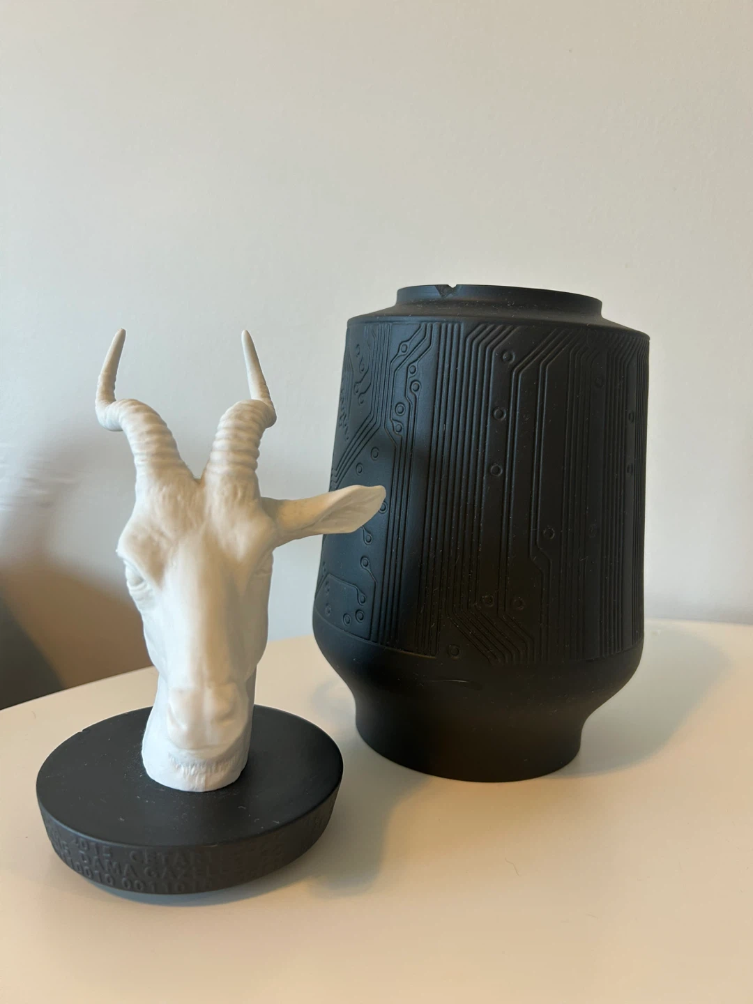 White Gazelle Head Sculpture on Black Base