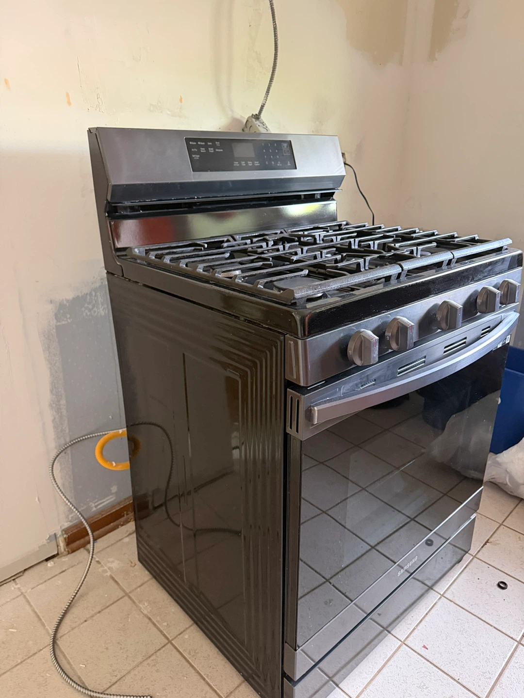 Samsung Gas Range with Oven and Samsung Refrigerator