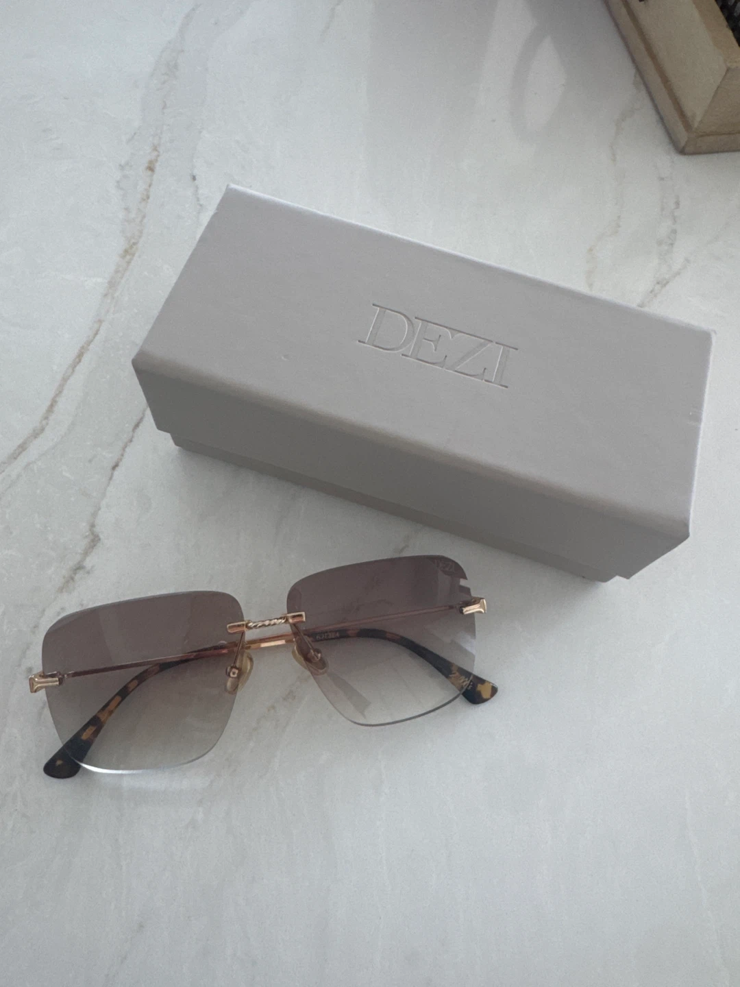 DEZI Rimless Sunglasses