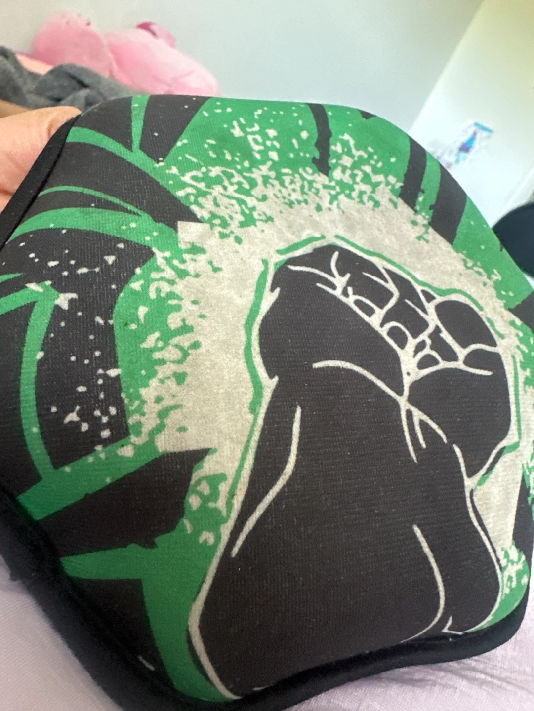 Black and green fist design pillow