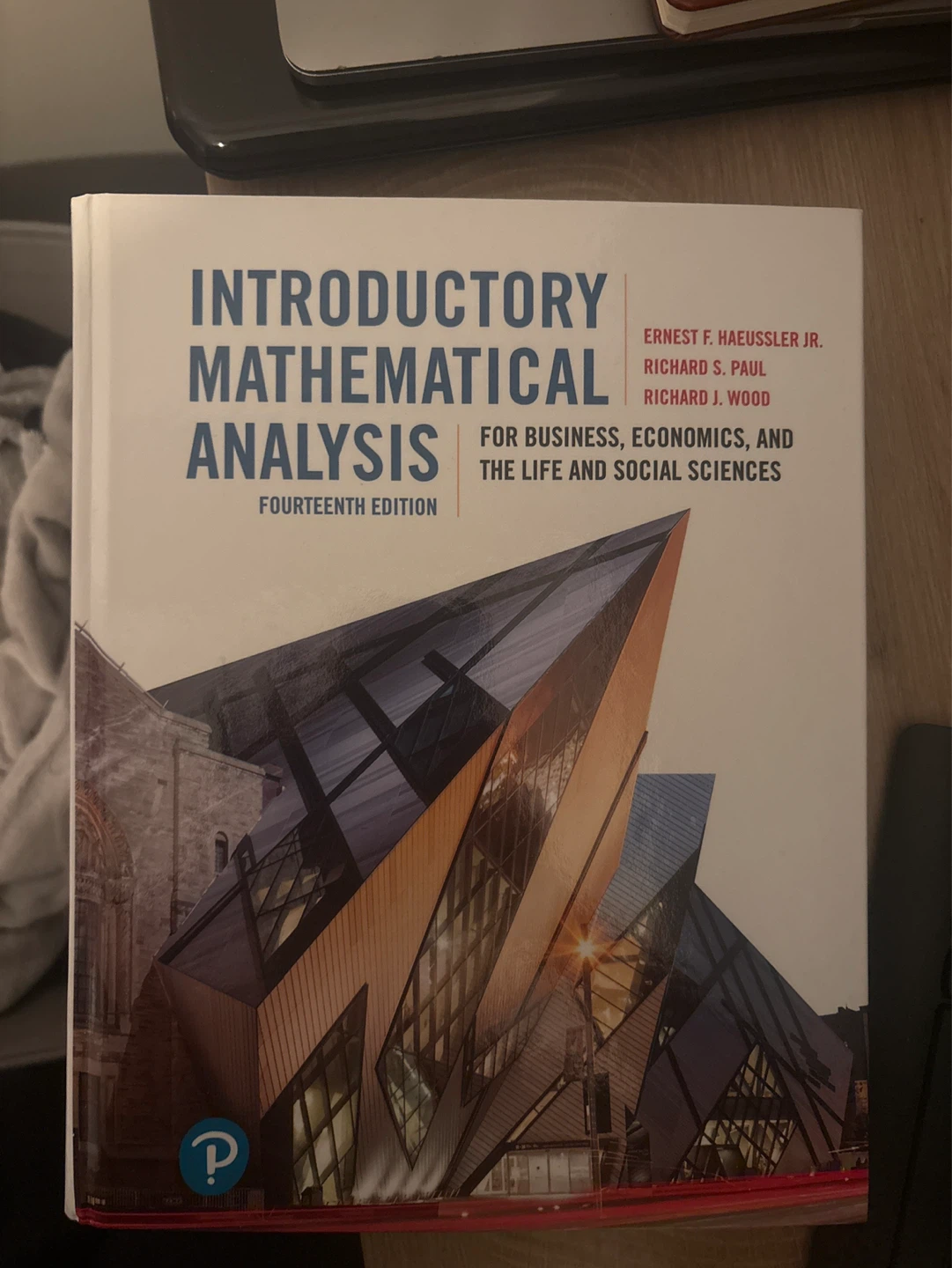 Introductory Mathematical Analysis 14th Edition Textbook