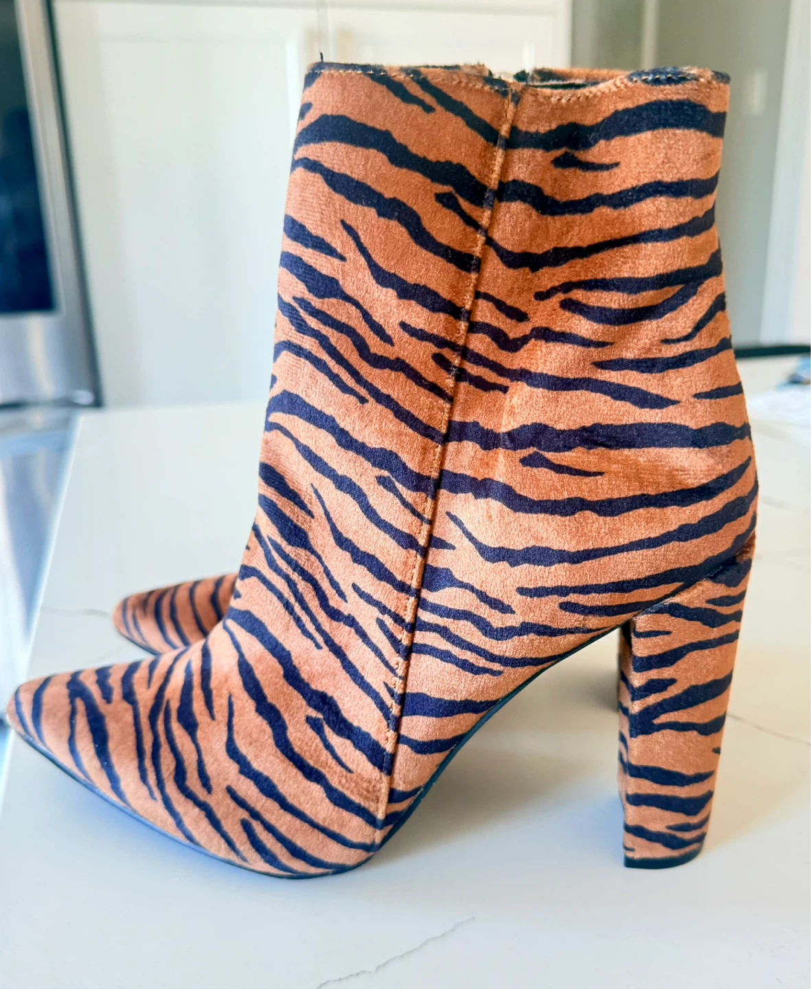 Tiger print heeled ankle boots