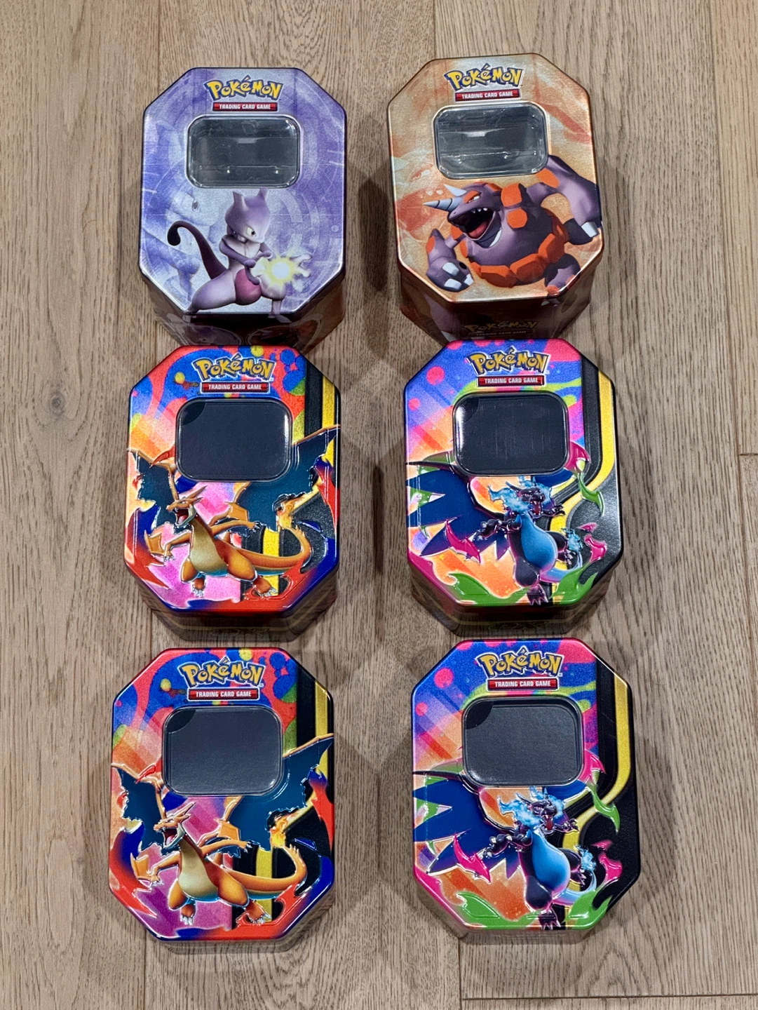 Pokémon Charizard and Mewtwo Tins
