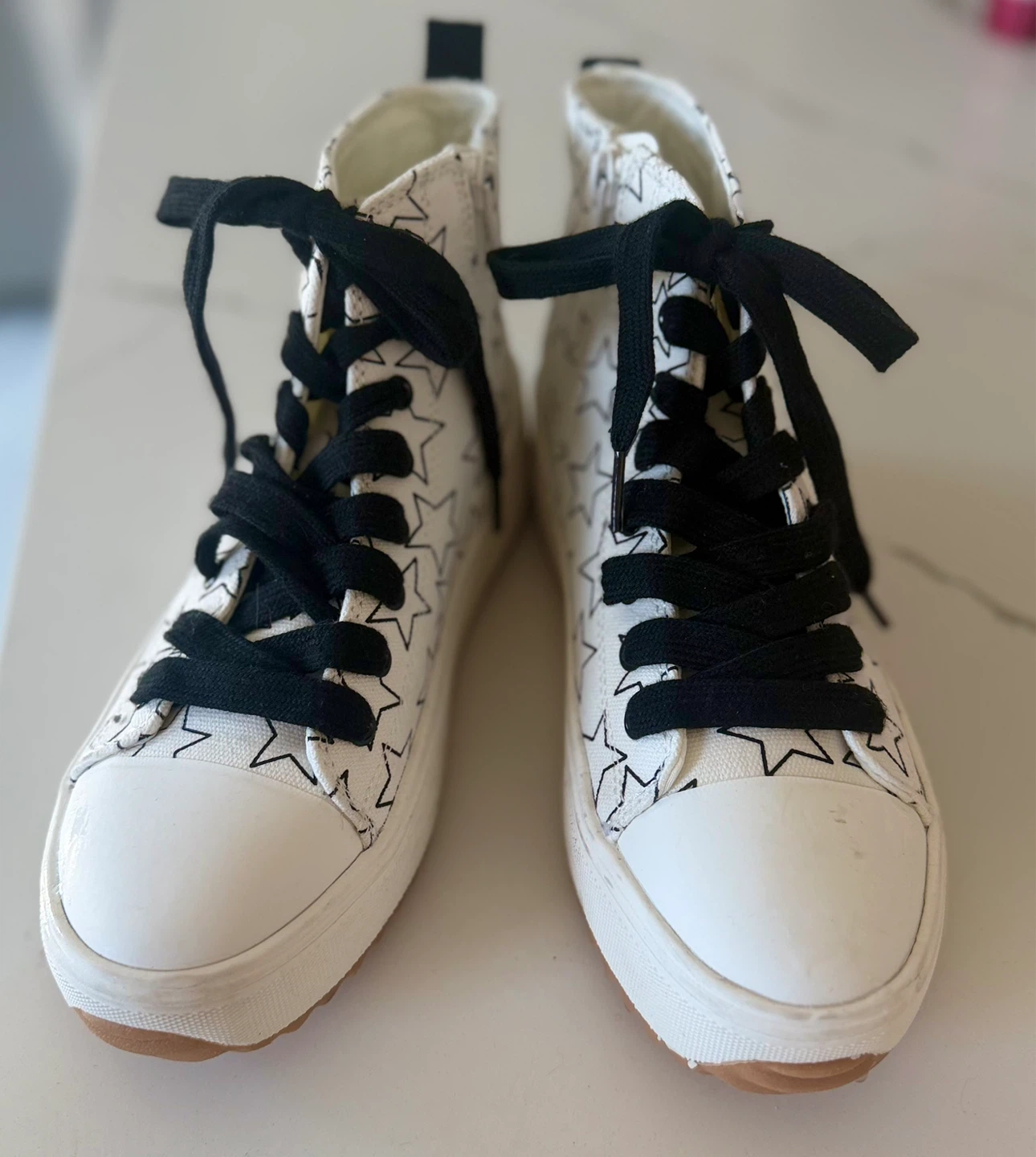 White High-Top Sneakers with Black Stars