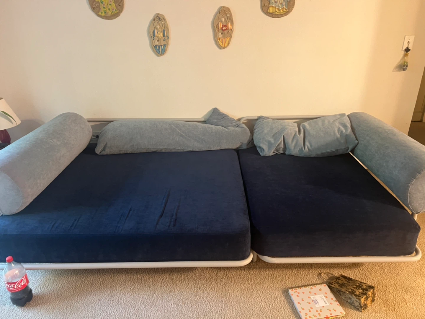 Blue Futon Couch with Bolster Pillows