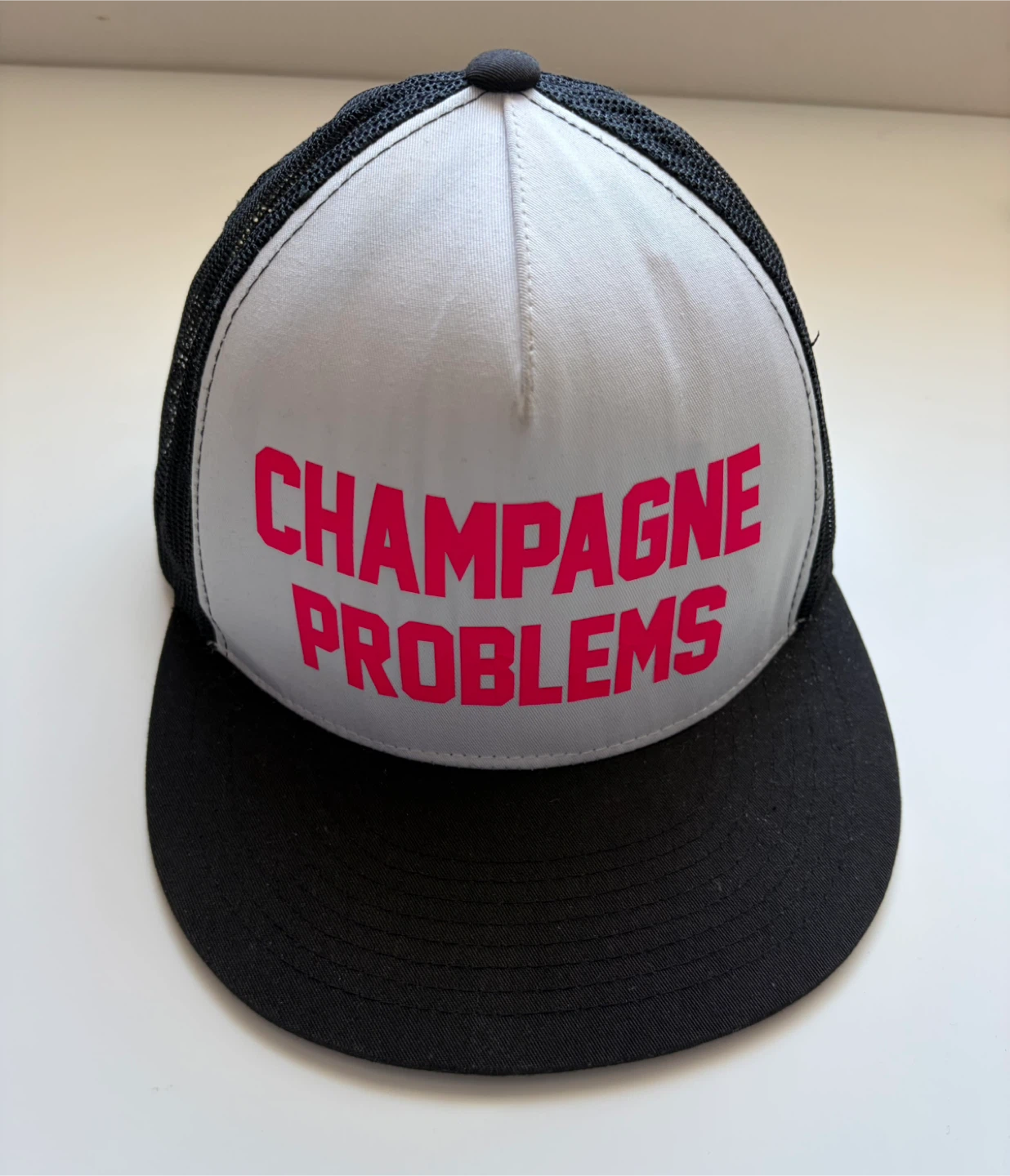 The Classics Yupoong Trucker Hat Champagne Problems