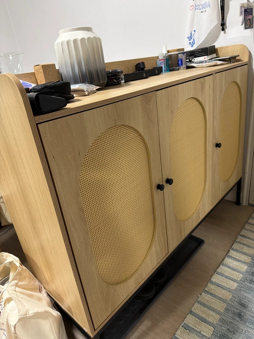 Light Wood 3-Door Shoe Cabinet with Rattan Accents