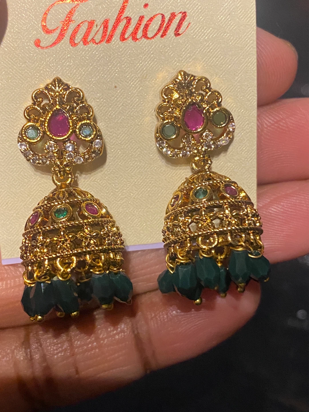 Gold-toned Jhumka Earrings with Red and Green Stones