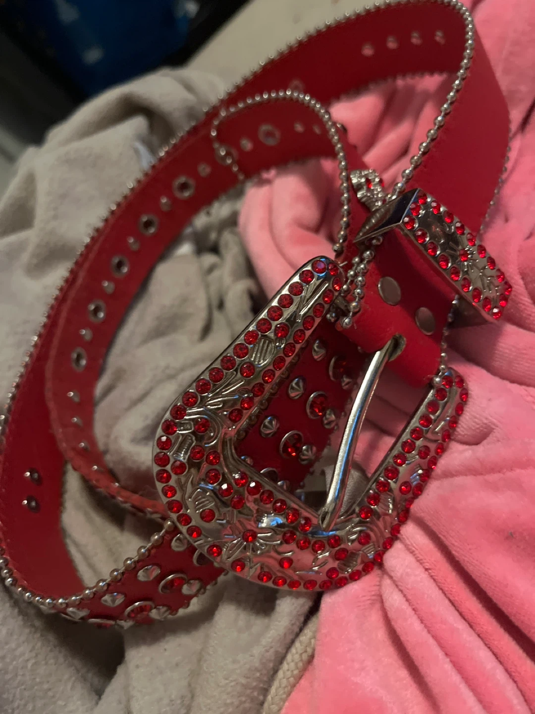 Red studded belt with rhinestones