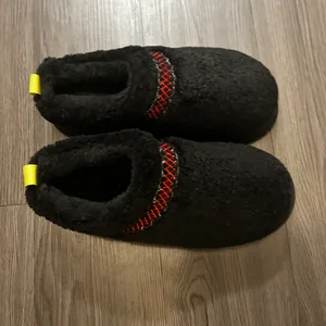 Black Fuzzy Slippers with Red Trim