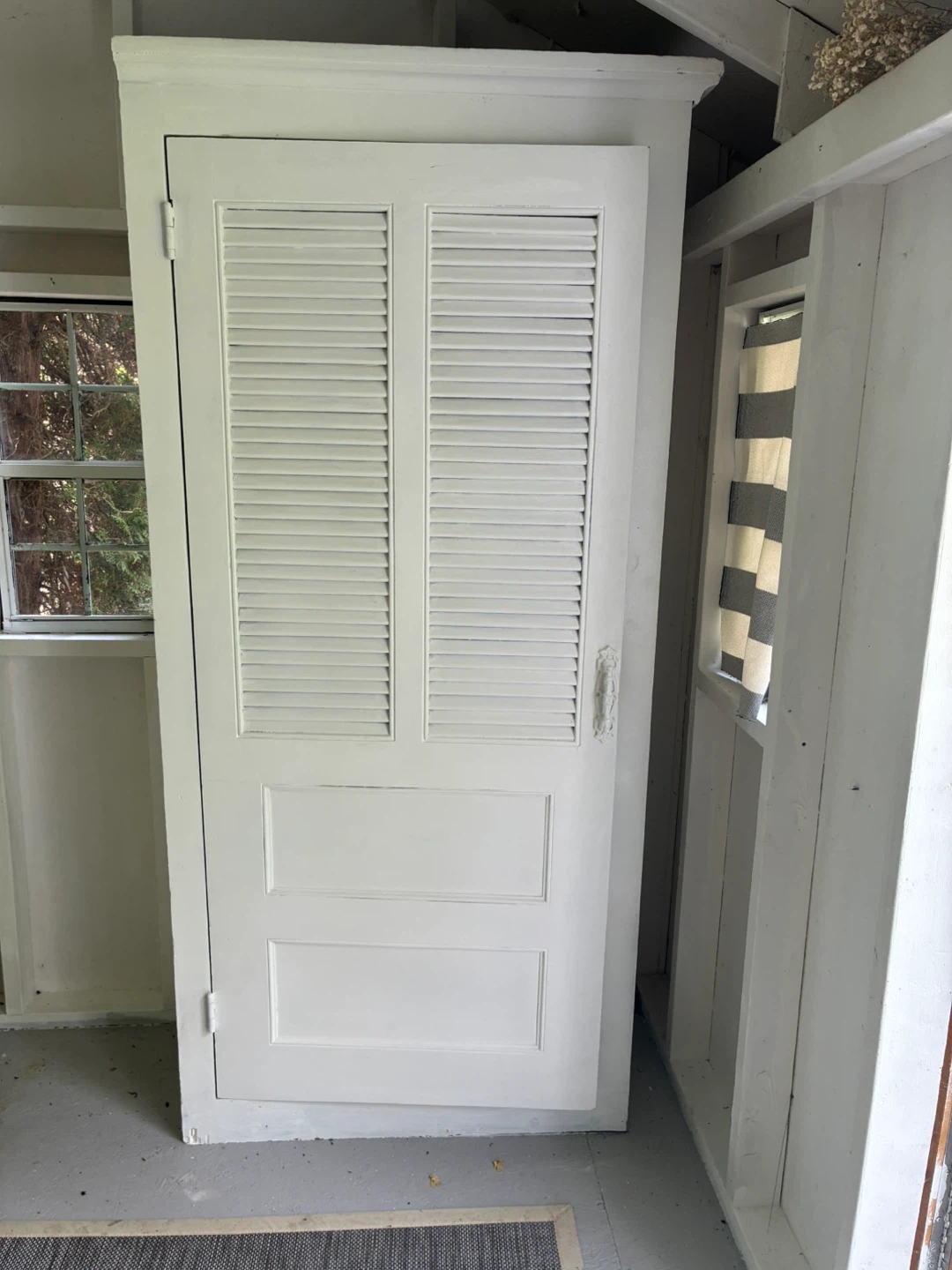 White Cabinet with Louvered Door