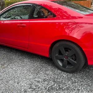 Red Honda Civic Coupe with Sunroof