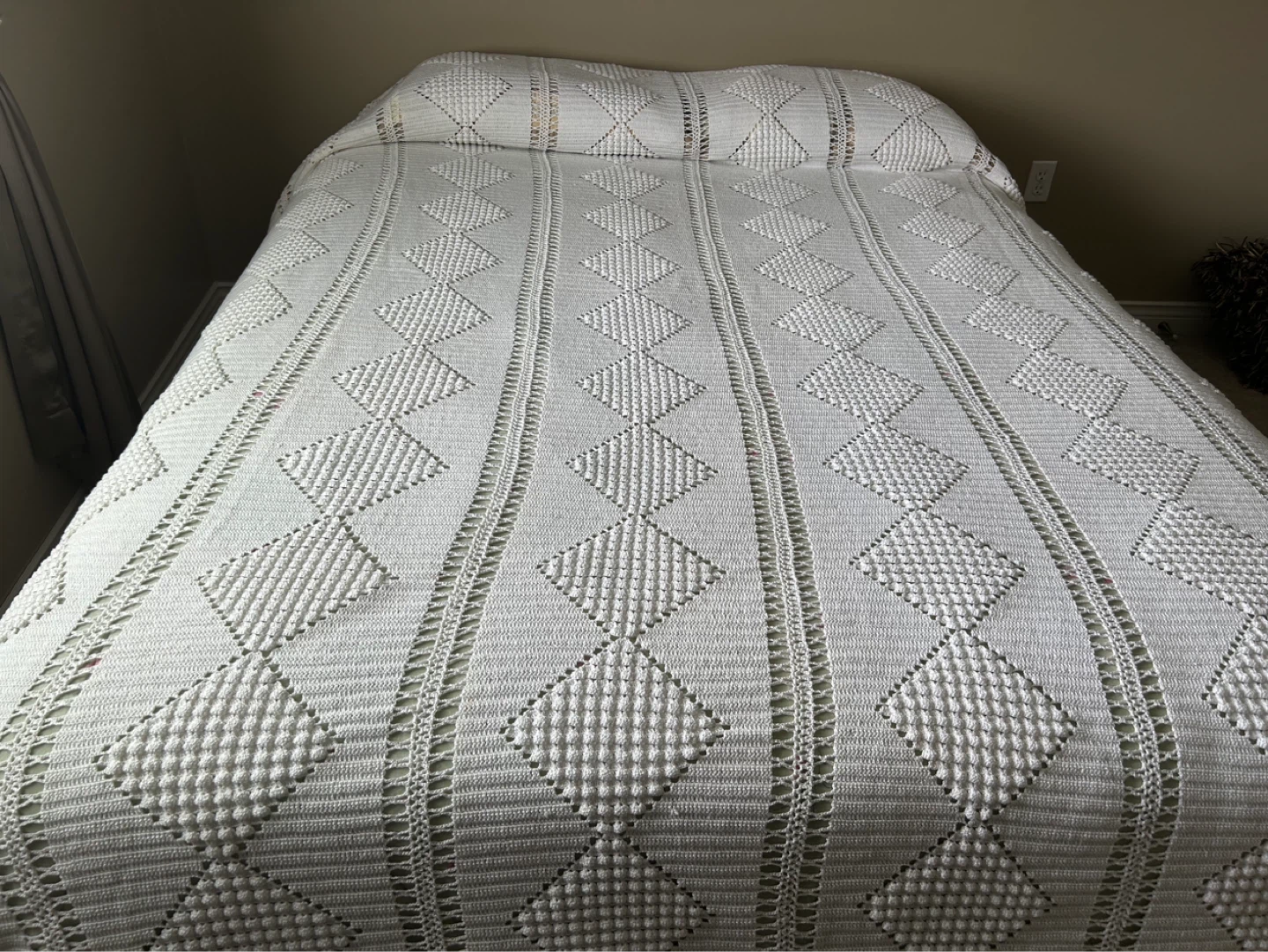 Cream-coloured hand crocheted queen size bedspread